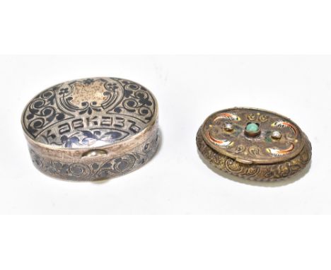 ANTIP IVANOVICH KUZMICHEV (POSSIBLY); a Russian silver and niello trinket box and cover of oval form, with gilded interior, t