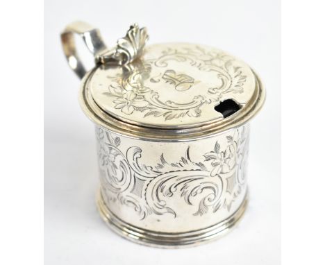 A Victorian hallmarked silver mustard, with engraved foliate detailing, London 1854, height 7cm, 3.4ozt/107g.Additional Infor