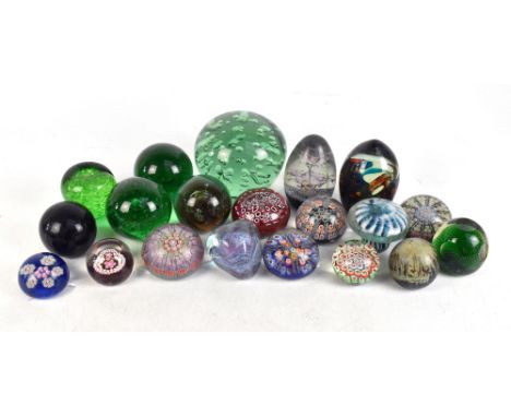 A collection of twenty glass paperweights, including a Victorian dump, various Caithness examples, a Strathearn example, (20)