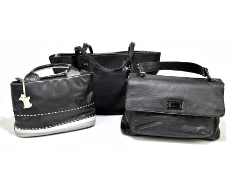 CALVIN KLEIN; a black nylon cloth and black leather tote bag with black leather jewel top handles with buckles and side pocke