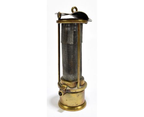 A late 19th century brass Newcastle-type miner's lamp, with two section gauze cylinder and domed lid, height 19cm.Additional 