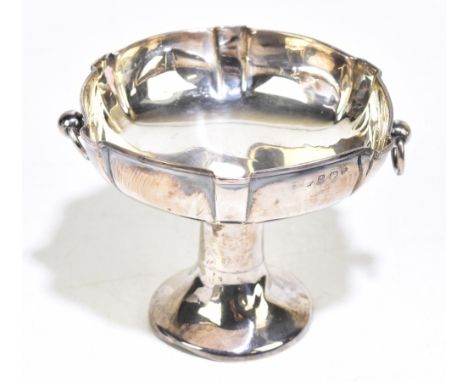 WILLIAM HUTTON &amp; SONS; an Edward VII hallmarked silver pedestal bowl with two applied loop handles, and panelled top, Bir