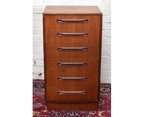 A mid-century teak pillar chest, with six drawers, on plinth base, height 103cm, width 56cm, depth 45cm.Additional Informatio