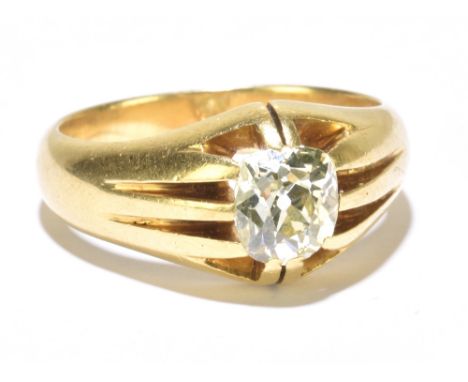 An 18ct yellow gold diamond solitaire ring, the cushion cut diamond weighing approx. 1.50cts, in claw setting, size R, approx