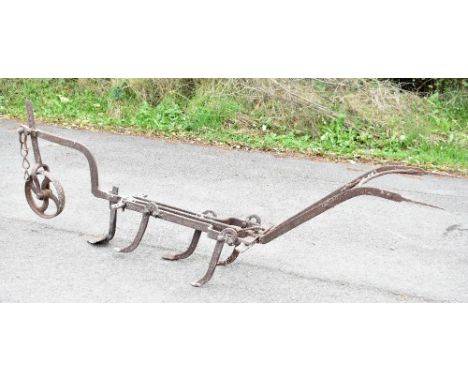 A vintage wrought iron plough with leading wheel.Additional InformationThis item is rusted through and in a barn find conditi