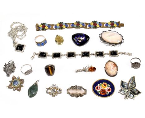 A group of costume jewellery including an enamel decorated base metal bracelet, various brooches, silver and tiger's eye ring