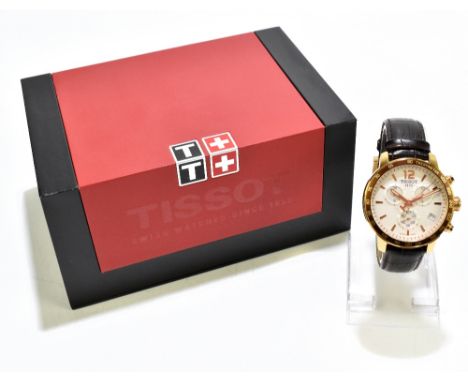TISSOT; a gentleman's gilt stainless steel chronograph, the matte dial set with three subsidiary dials and date aperture, num