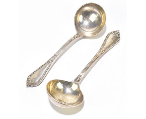 JOSEPH AND HORACE SAVORY; a pair of late Victorian hallmarked silver sauce ladles, London 1888, length 17cm, approx 6.06ozt/1