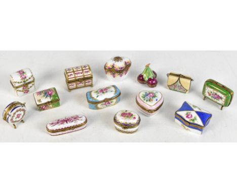 ART GALLERY; a collection of twelve porcelain trinket boxes of varying design and decorated throughout with flowers, the long