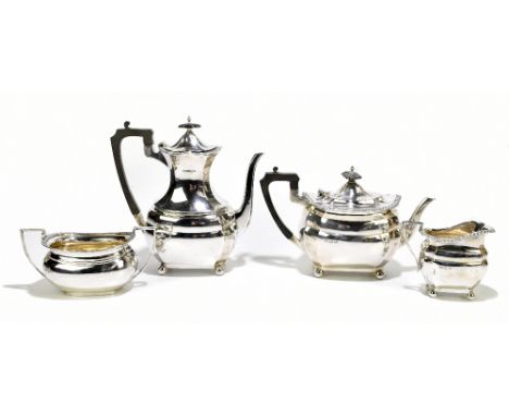 WALKER &amp; HALL; a hallmarked silver tea service, comprising coffee pot, tea pot and milk, Sheffield 1905/10 and 11, with a