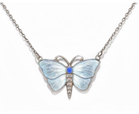 CHARLES HORNER; a sterling silver and blue enamel decorated butterfly necklace with oval dark blue panel to the butterfly's h