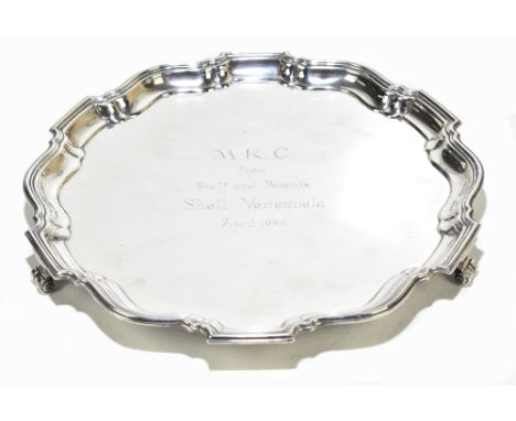 BARKER ELLIS &amp; SON; a George VI hallmarked silver salver with cast scalloped edge with engraved presentation plaque 'MKC 