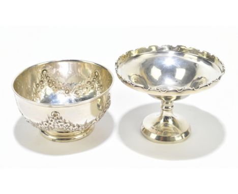 STOKES &amp; IRELAND LTD; a hallmarked silver bowl, embossed with floral swags, Chester 1910, 3.5ozt/109g, diameter 10cm, tog