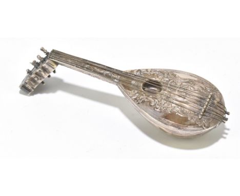 A 19th century Continental novelty silver scent bottle, modelled as a lute with figural and scroll decoration in relief, Lond