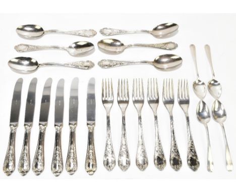 A part suite of Continental white metal cutlery, comprising six dessert spoons, six table forks and six white metal handled s