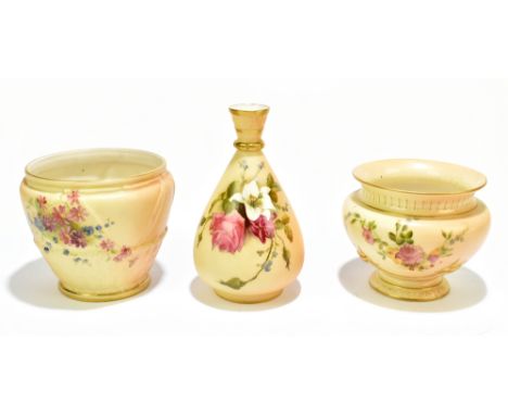 ROYAL WORCESTER; three pieces of blush ivory including two planter, one with moulded decoration and a tapering vase decorated