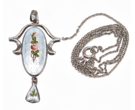 CHARLES HORNER; a sterling silver and painted pale blue enamel decorated pendant of pierced form, stamped sterling and with m