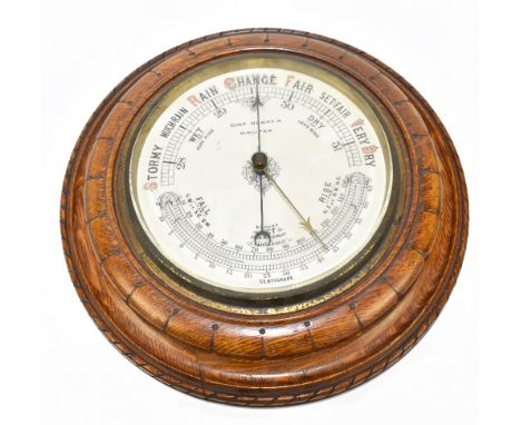 CHARLES HORNER; a 1920s circular oak barometer/thermometer, inscribed to the dial 'Chas Horner Halifax', diameter 34cm.Additi