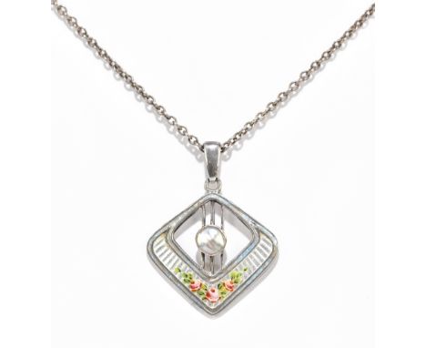 CHARLES HORNER; a George V hallmarked silver and floral painted white enamel decorated pierced lozenge shaped pendant centred