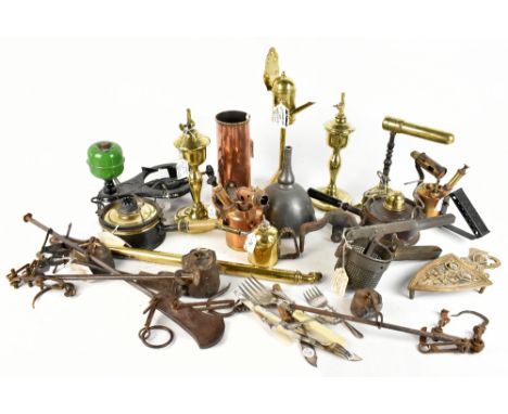 A collection of Victorian and later metalware including goffering iron, meat hanger, various balance scales, etc.