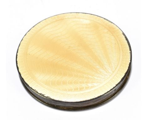 A George V hallmarked silver and pale yellow guilloche enamelled compact of circular form, Birmingham 1945, diameter 7cm.Addi