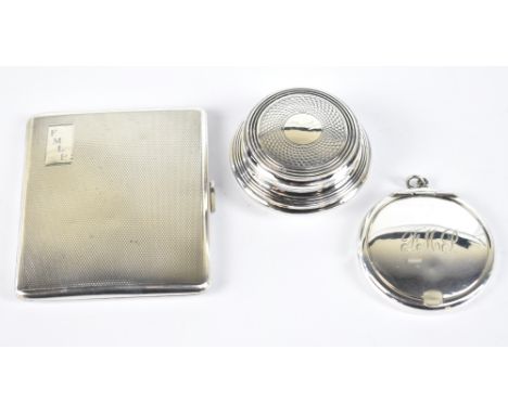 WILLIAM NEALE LTD; a George V hallmarked silver cigarette case with engine turned decoration surrounding a rectangular cartou