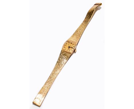 BUECHE GIROD; a lady's 9ct gold wristwatch, the square dial with baton numerals, with integral textured strap, total weight 3