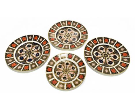 ROYAL CROWN DERBY; four Imari plates decorated in the 1128 pattern, diameter of larger examples 27cm (4).Additional Informati