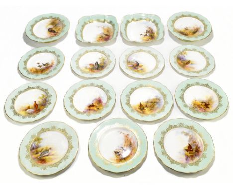 ROYAL WORCESTER; a fifteen piece hand painted part dessert service, decorated with game in landscape, inside gilt scrolling d