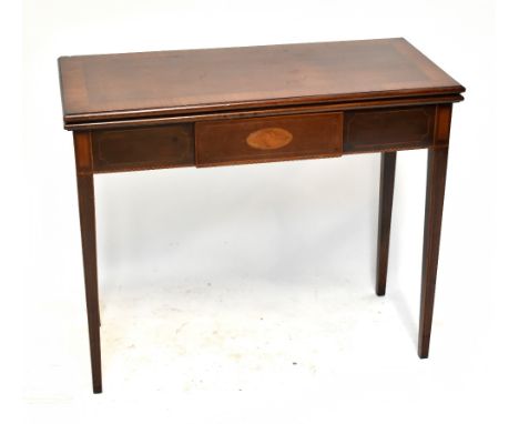 A George III mahogany rectangular foldover tea table, with later inlay and breakfront central drawer on square legs, height 7