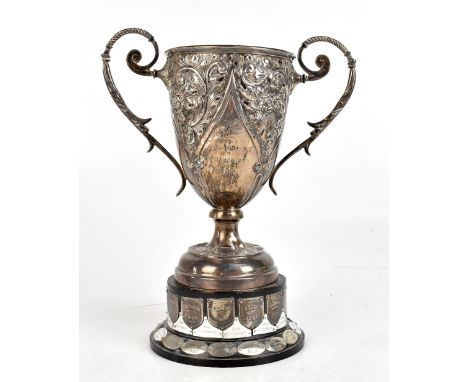 An Edwardian hallmarked silver twin handled trophy cup 'The Riley Trophy' presented for Annual Competition in the L.C.C. Lake