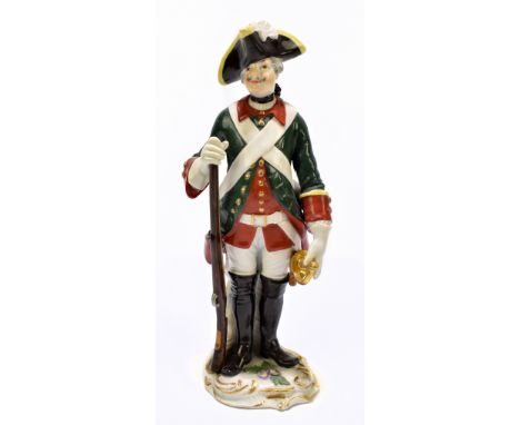 MEISSEN; an early 20th century figure of a soldier, painted marks to base, twice scratched through with painted number 25, in