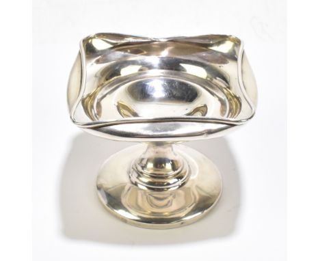 OWEN &amp; ROBINSON LTD; a George V hallmarked pedestal bonbon dish, with pinched rim, Chester 1913 (filled).&nbsp;Additional