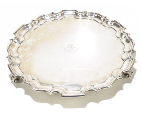 GOLDSMITHS &amp; SILVERSMITHS COMPANY LTD; a George V hallmarked silver circular tray with central engraved armorial and rais
