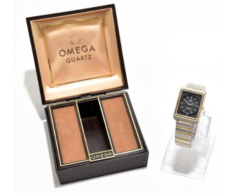 OMEGA; a 1970s gentleman's Seamaster quartz bi-metallic wristwatch with rectangular case and circular dial set with date aper