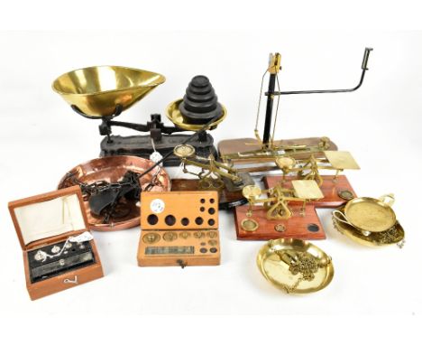 A group of 19th century and later scales including three Post Office scales and weights, a cased set of J.W Towers weights.