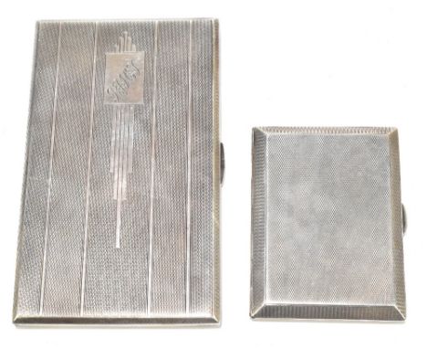 A George VI hallmarked silver cigarette case of rectangular form with engine turned detail and engraved initials to a rectang