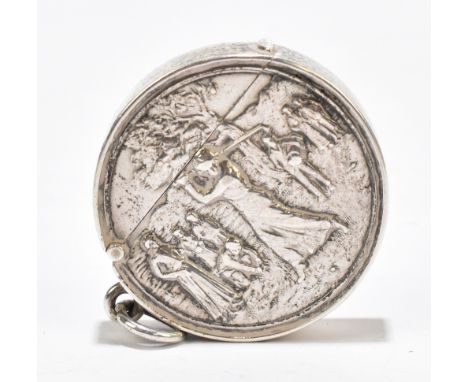 GOLF INTEREST; an Edwardian hallmarked silver circular vesta case decorated with a female golfer mid-swing, Birmingham 1906, 