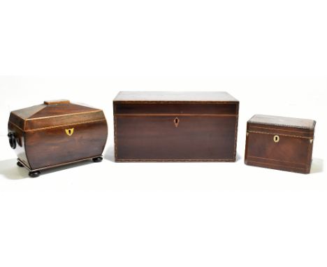 A Georgian marquetry inlaid mahogany tea caddy of rectangular form, with boxwood inlaid decoration and escutcheon, width 31cm