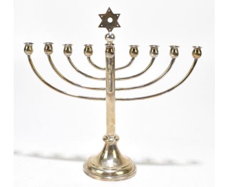 VINERS LTD; a hallmarked silver menorah on circular base, Sheffield 1957, height 26.5cm, approx 13.5ozt/419g.Additional Infor