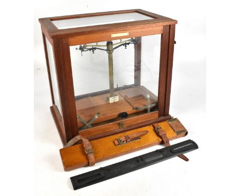 GEORGE &amp; BECKER; an early 20th century lacquered brass and mahogany laboratory scales, height 42cm, width 45cm, together 