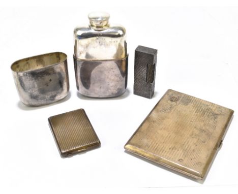 A George V hallmarked silver cigarette case of rectangular form, Birmingham 1921, 11.5 8.5cm, a George V hallmarked silver ma