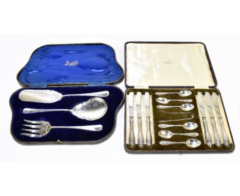 WALKER &amp; HALL; a cased set of hallmarked silver teaspoons, dessert knives and matching sugar tongs, each decorated with a