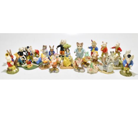 ROYAL DOULTON; a collection of Royal Doulton, Beswick and Royal Albert figures including 'Rupert's Toy Railway' numbered 1499