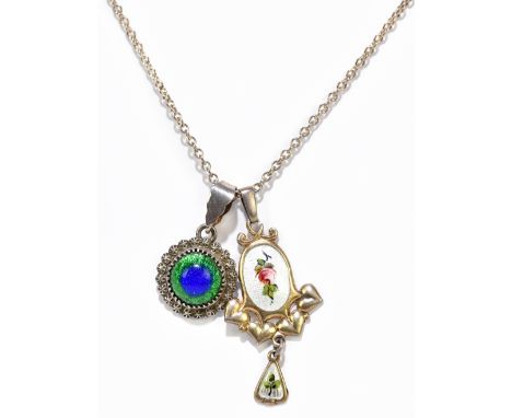 CHARLES HORNER; a George V hallmarked silver and floral painted blue enamelled pendant, Chester 1914, length 3.5cm, and a fur