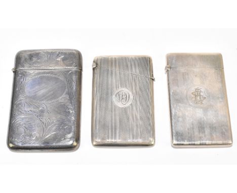 A George V hallmarked silver card case of rounded rectangular form with engraved initials to a circular cartouche, Chester 19