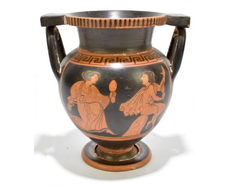 A Greek red figure terracotta urn with everted rim, twin moulded handles and twin panels decorated with figures raised on a s