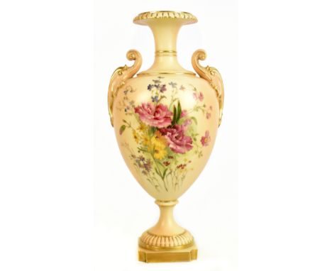 ROYAL WORCESTER; a large pedestal twin handled vase, with moulded handles and floral decoration, numbered 1969 to the undersi