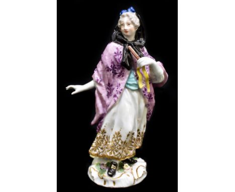 MEISSEN; an 18th century figure of a woman holding a fan in her left hand, painted marks to back of base, impressed number 66