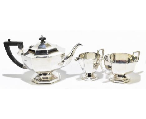 JOHN TURTON &amp; CO; a George V hallmarked silver three piece tea service of octagonal form, Sheffield 1935, approx 33.10ozt